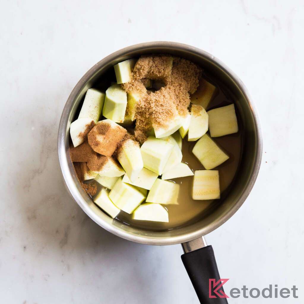 Chopped zucchini and sweetener in a saucepan.