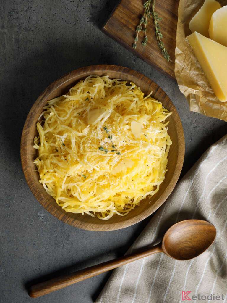 Serving spaghetti squash noodles with parmesan, olive oil and basil.
