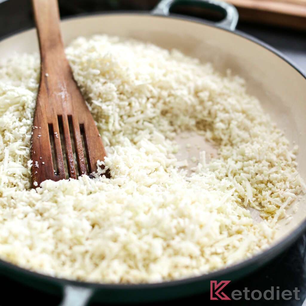 Cooking cauliflower rice.