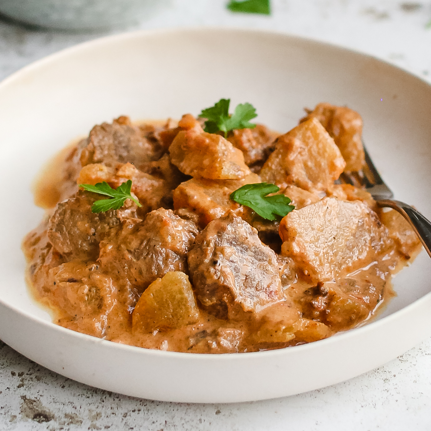 Hearty Beef and Vegetable Stew served on a plate.